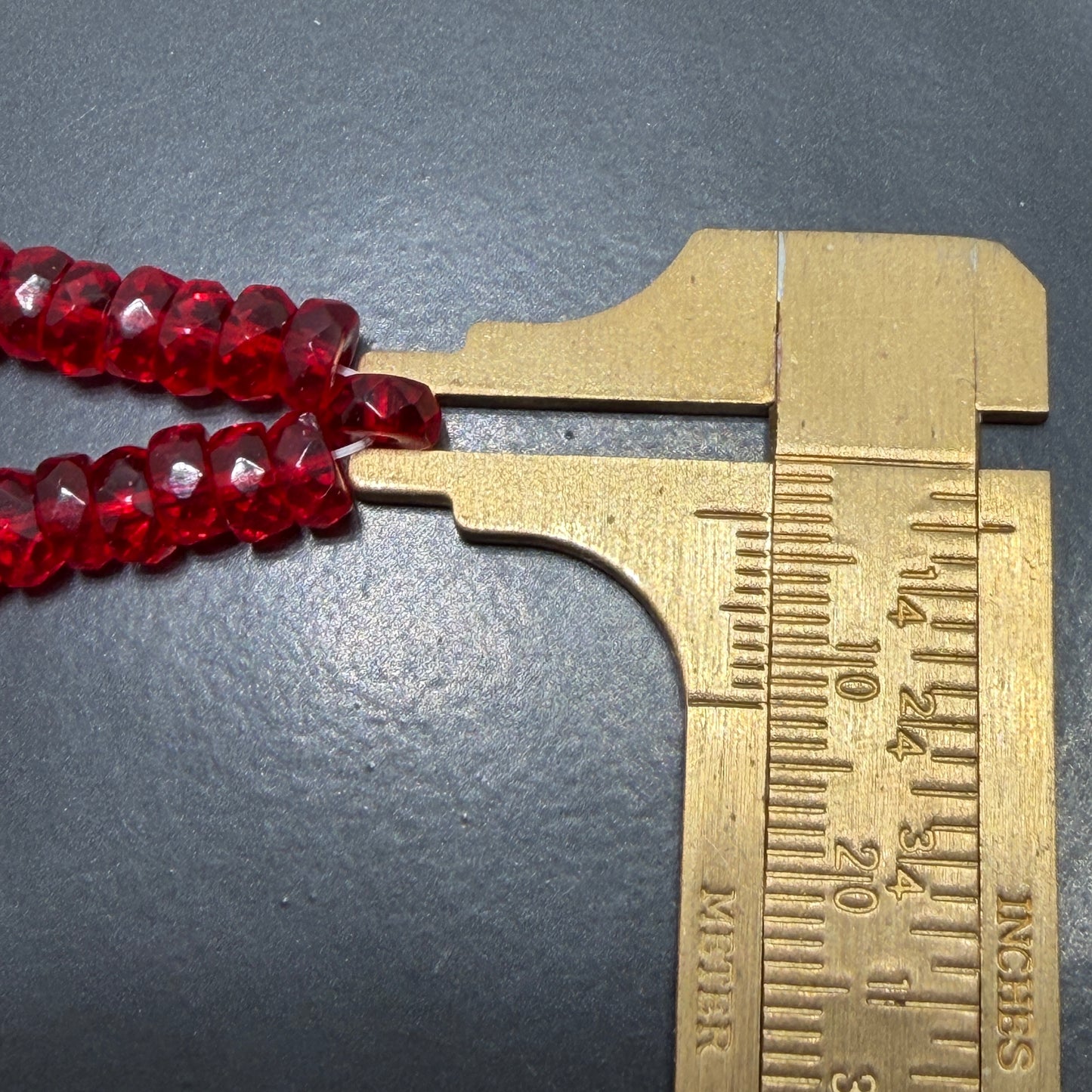Transparent Siam Faceted Rondell 6mm