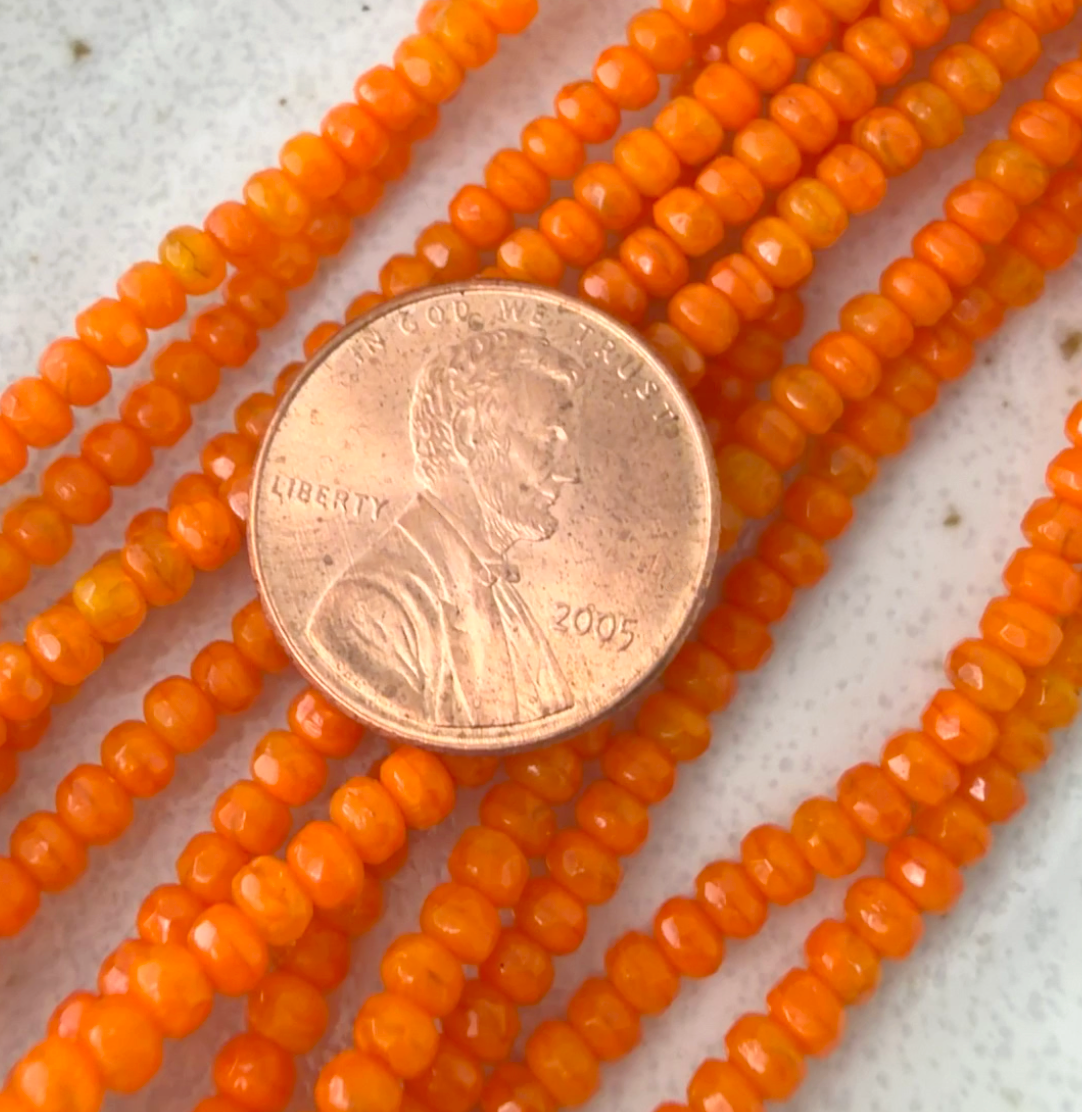 Tiny Orange Faceted Rondell