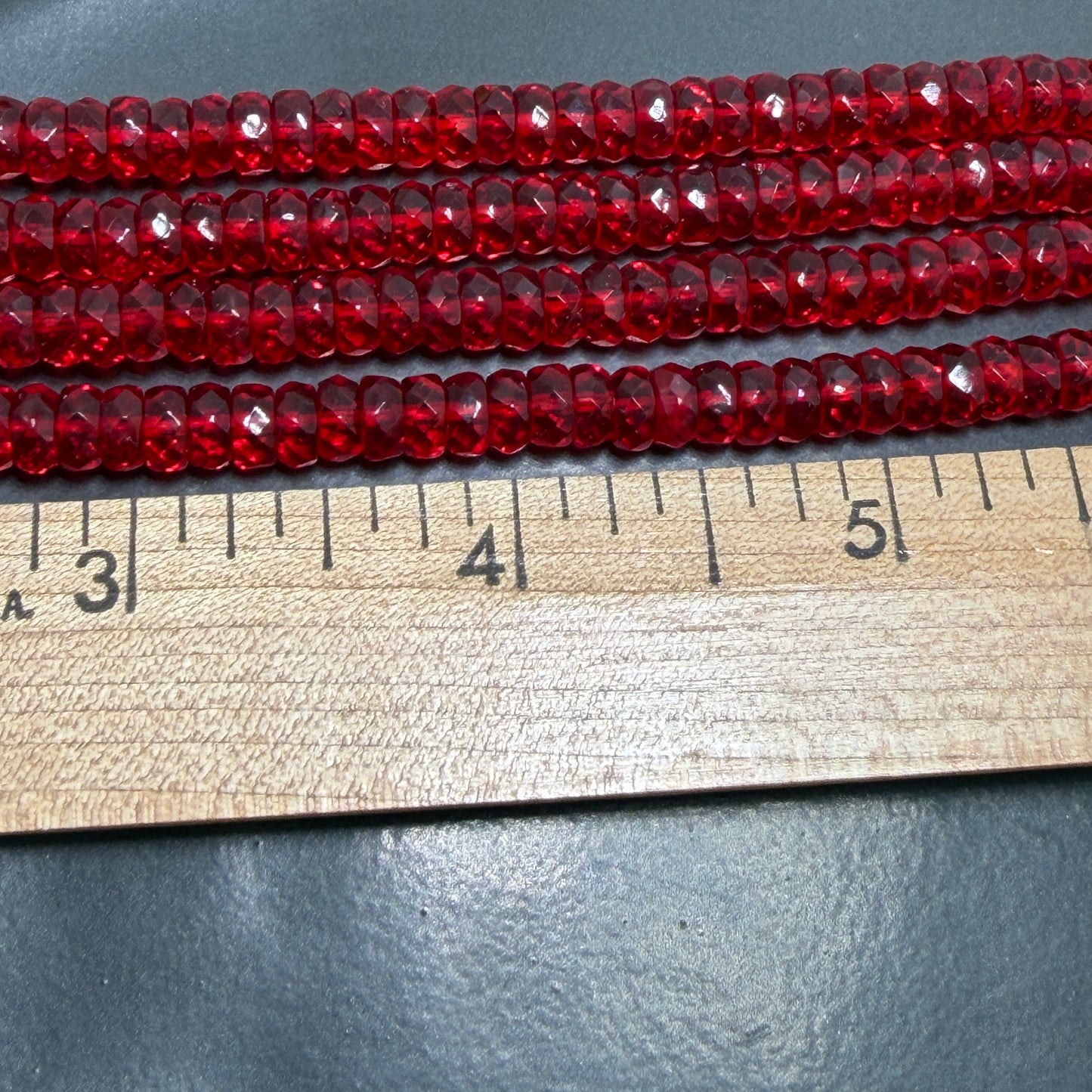 Transparent Siam Faceted Rondell 6mm