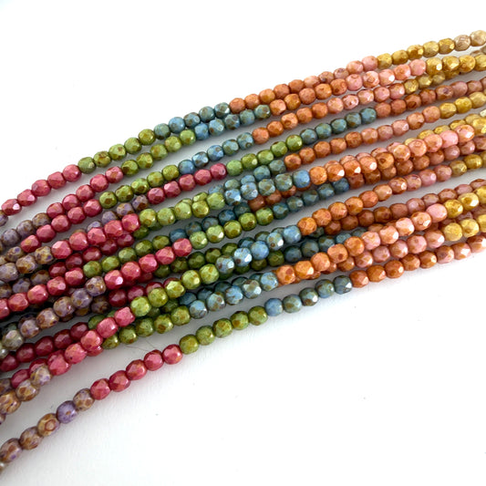 3mm Czech Fire Polish - 9-color Picasso Rainbow Luster – 45 pcs. Five pieces of each color.