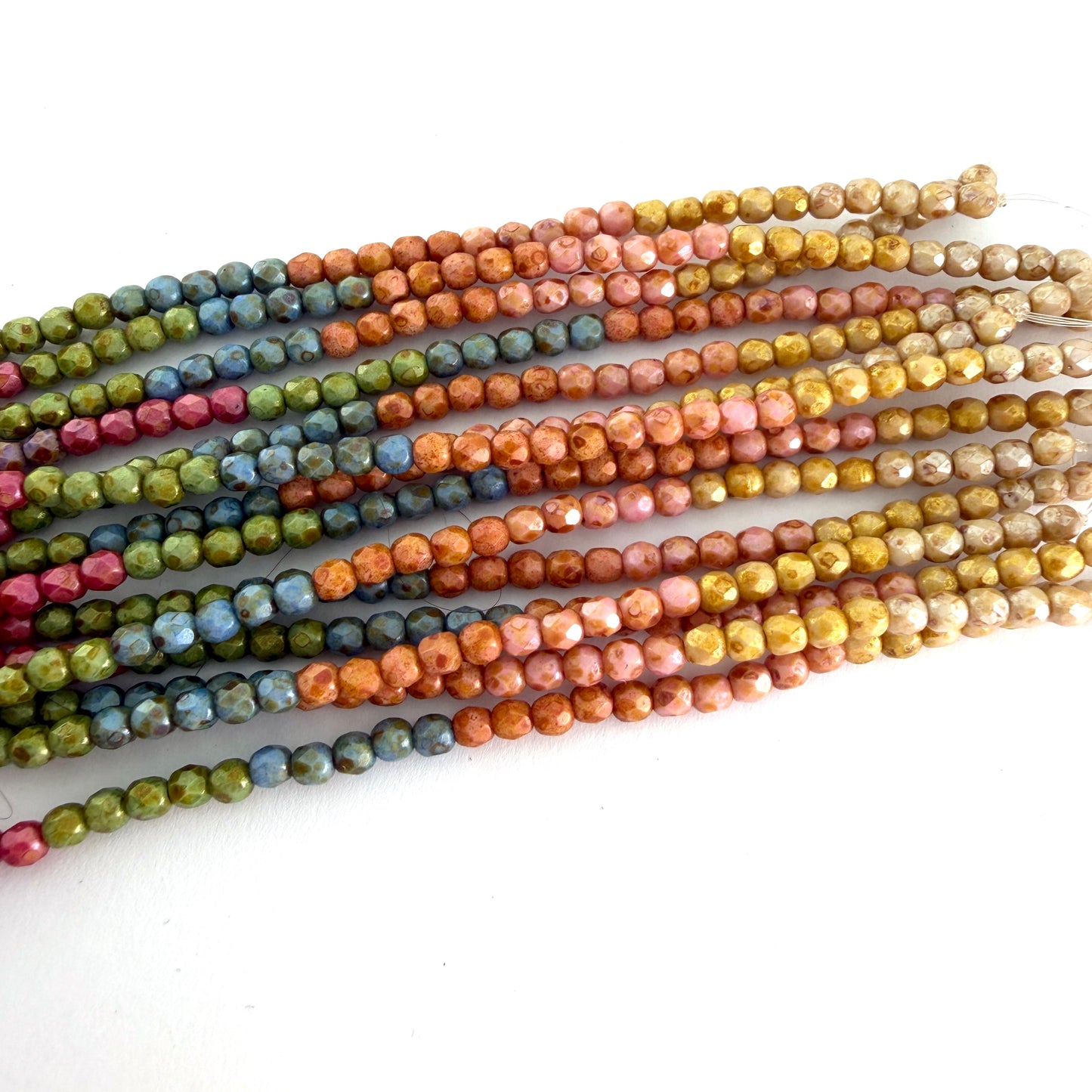 3mm Czech Fire Polish - 9-color Picasso Rainbow Luster – 45 pcs. Five pieces of each color.