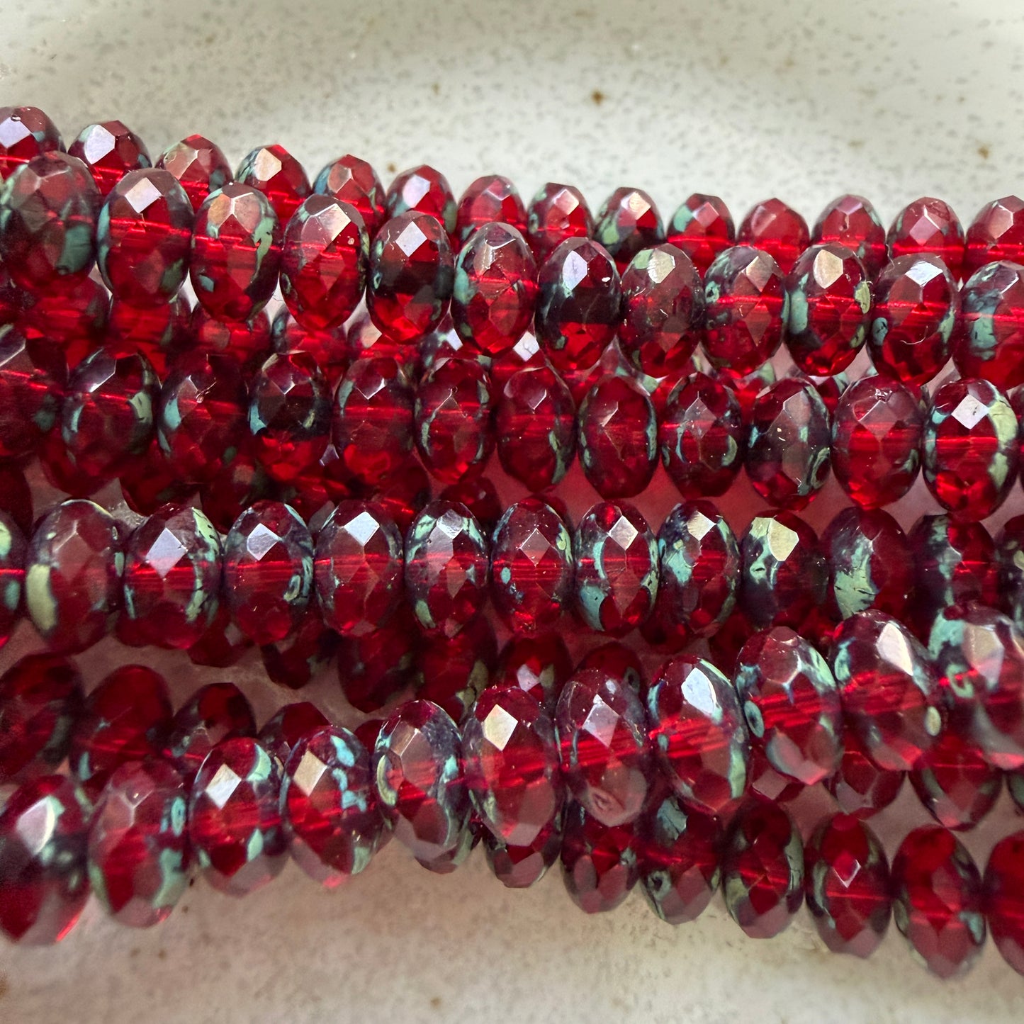 Transparent Siam Picasso Faceted Rondell 4mm x 7mm