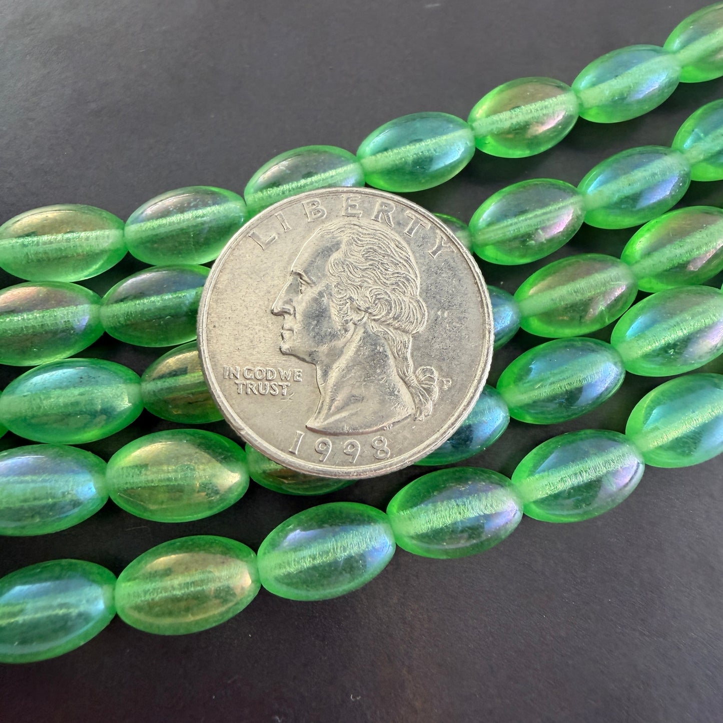 Transparent Peridot Rainbow Iris Oval