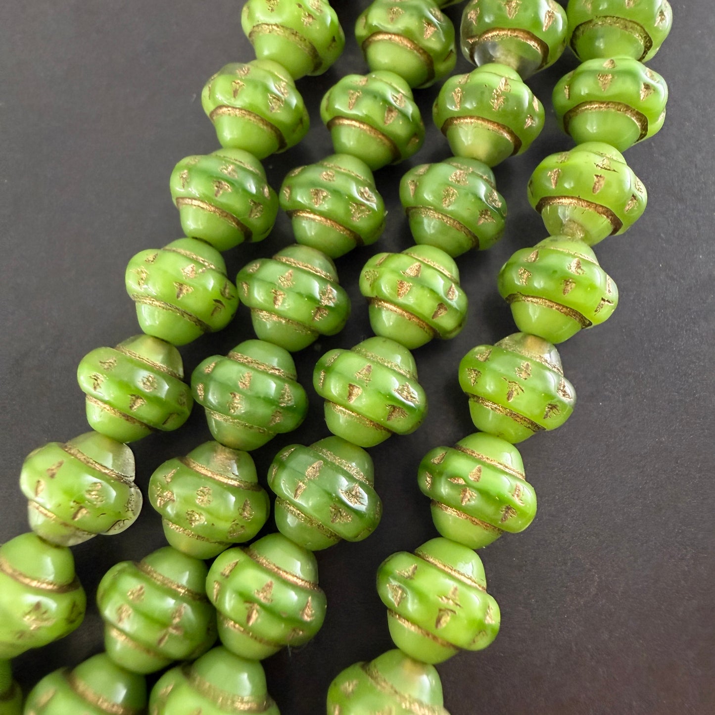 Green and Gold 7mm Spinner Bead