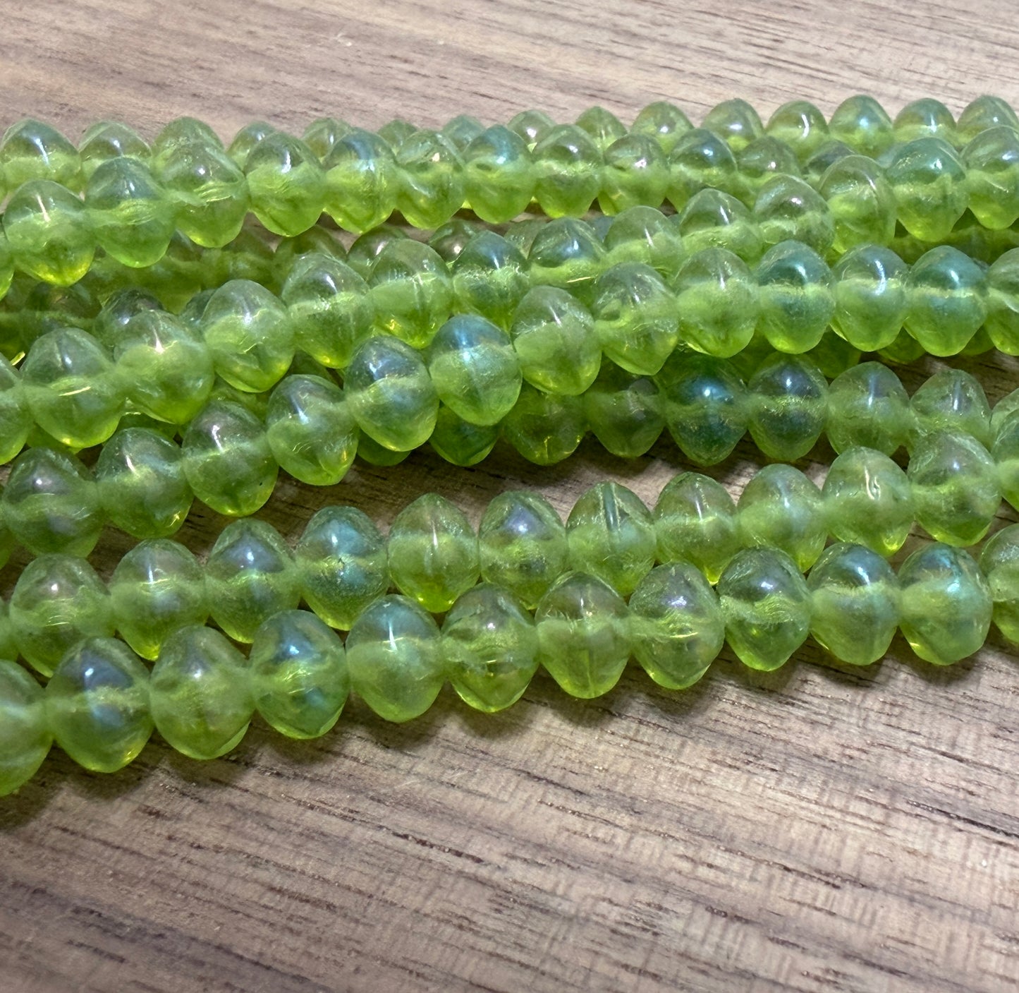 Green Rainbow Iris Rondell. 6mm. 33 beads