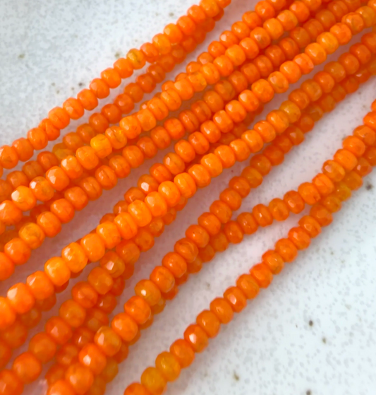 Tiny Orange Faceted Rondell