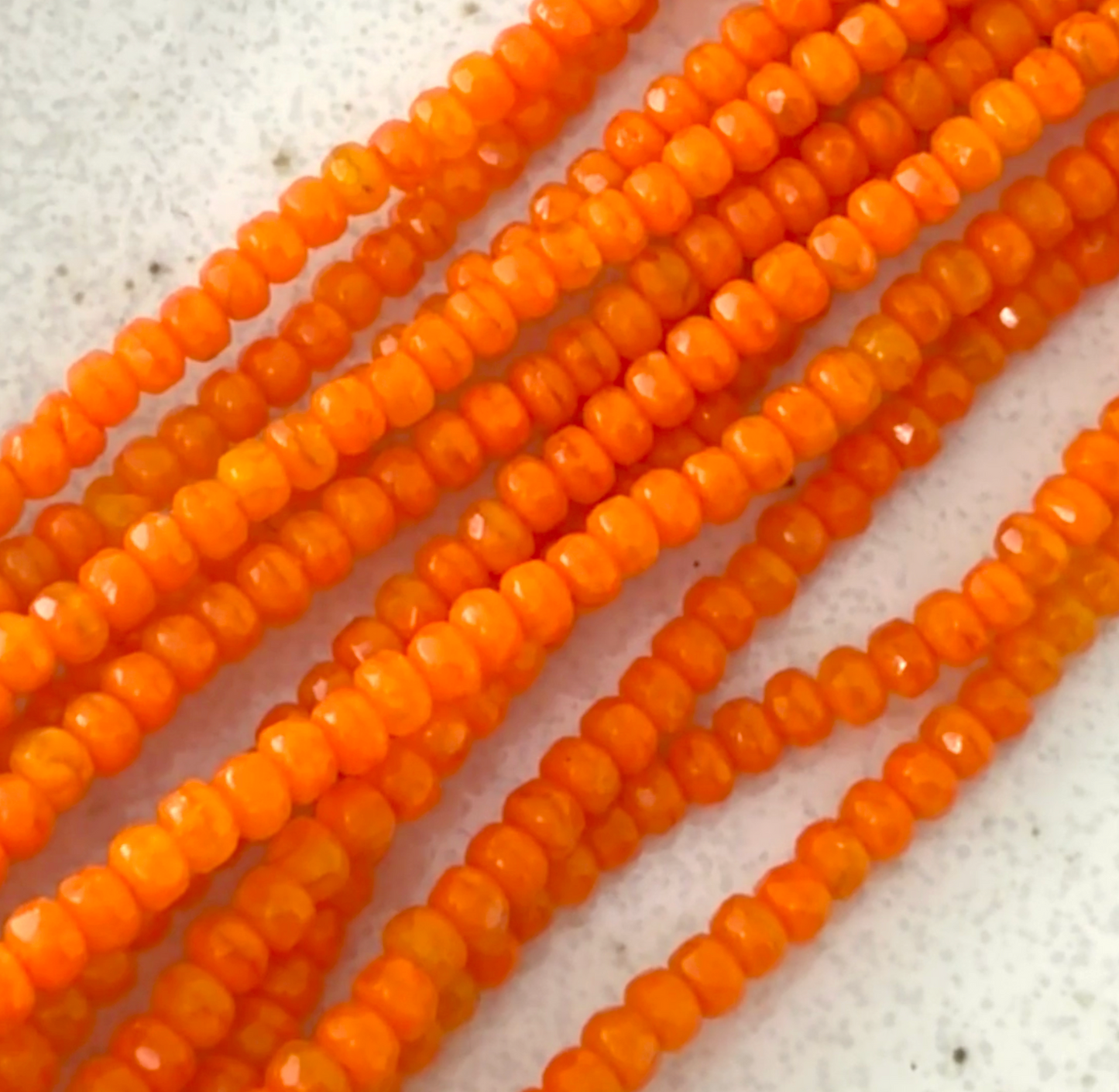 Tiny Orange Faceted Rondell